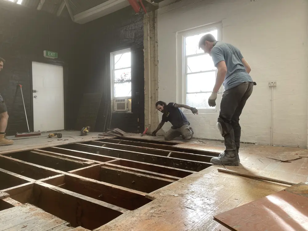 Old boards out, joists bare